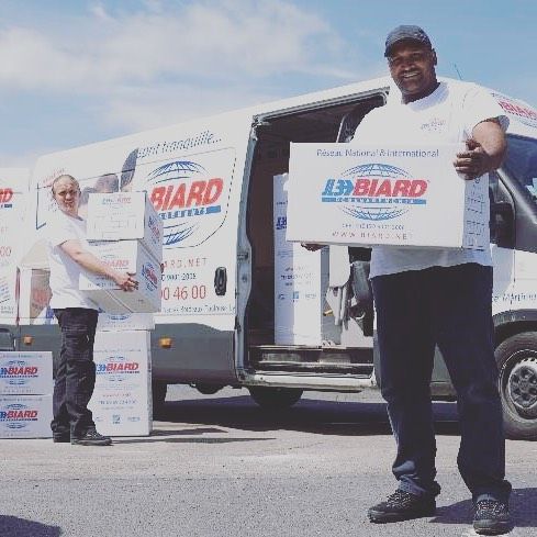 Équipe Biard chargeant un camion